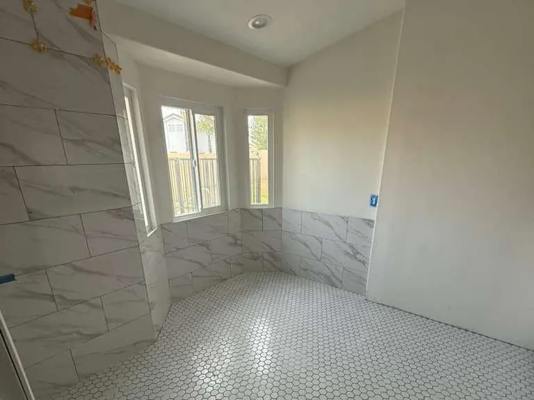 Corona residence — newly tiled bathroom