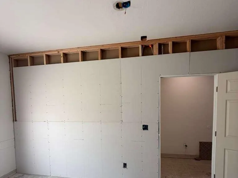 Skyland residence — drywall removed, framing exposed
